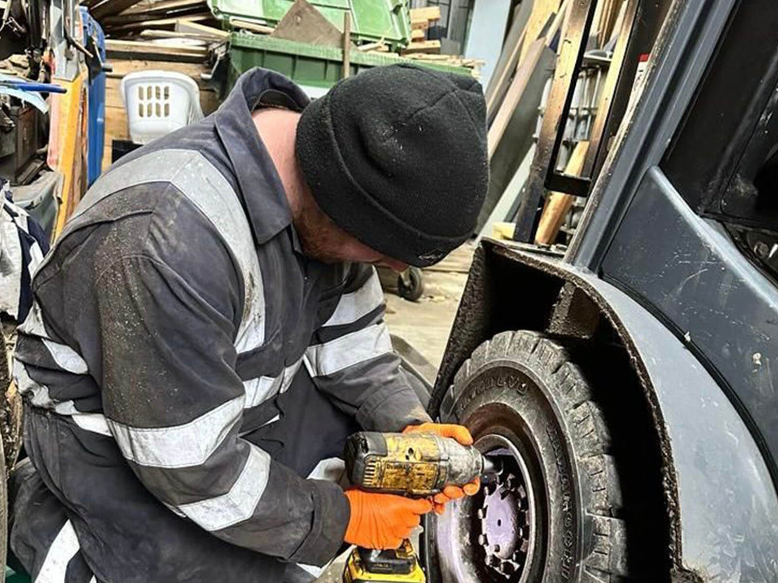 Andrew Murphy working on a forklift truck