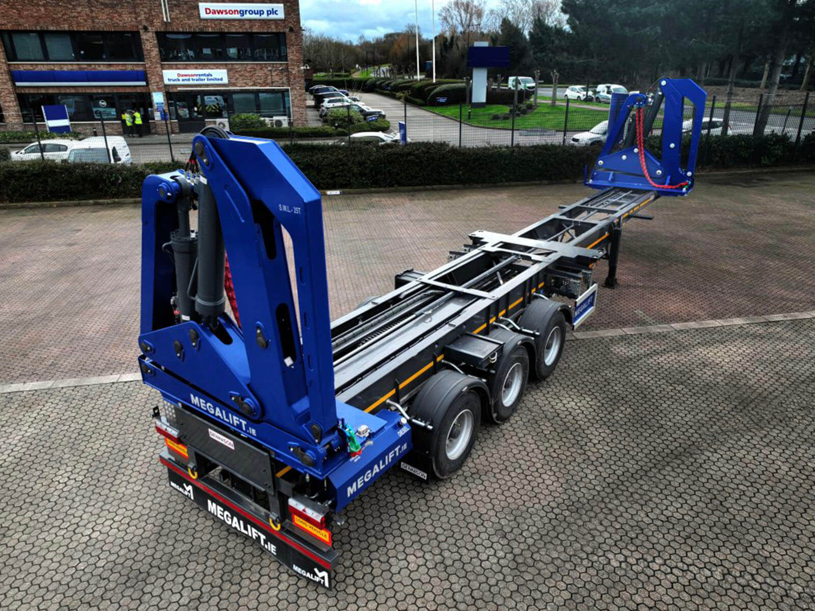 DVSA article - Megalift crane truck in car park in front of Dawsongroup building